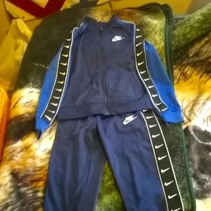 Little boys blue Nike athletic suit in size 7, 2 pc. set.